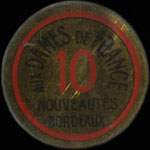 Timbre-monnaie Aux Dames de France - Nouveautés - Bordeaux - 10 centimes rouge sur fond doré - avers