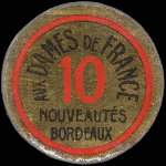 Timbre-monnaie Aux Dames de France - Nouveautés - Bordeaux - 10 centimes rouge sur fond gris - avers