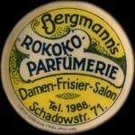 Timbre-monnaie Bergmann's Rokoko Parfümerie - 10 pfennig olive sur fond rouge - avers