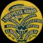 Timbre-monnaie Lindemeyer, Hobbie & Co à Elberfeld - 10 pfennig olive sur fond rouge - avers