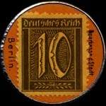 Timbre de 10 pfennig olive sur fond orange avec inscriptions au revers