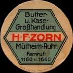Timbre-monnaie H.F.Zorn à Mülheim-Ruhr - 10 pfennig olive sur fond rouge - avers