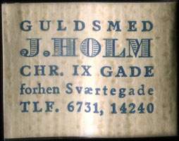 Timbre-monnaie Guldsmed J. Holm - Chr. IX Gade - forhen Sværtegade - Tlf. 6731, 14240 - 1 øre sur fond crème - texte bleu (type 2) - Danemark
