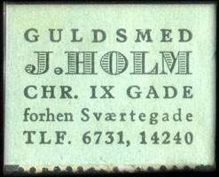 Timbre-monnaie Guldsmed J. Holm - Chr. IX Gade - forhen Sværtegade - Tlf. 6731, 14240 - 1 øre sur fond vert - texte noir (type 2) - Danemark